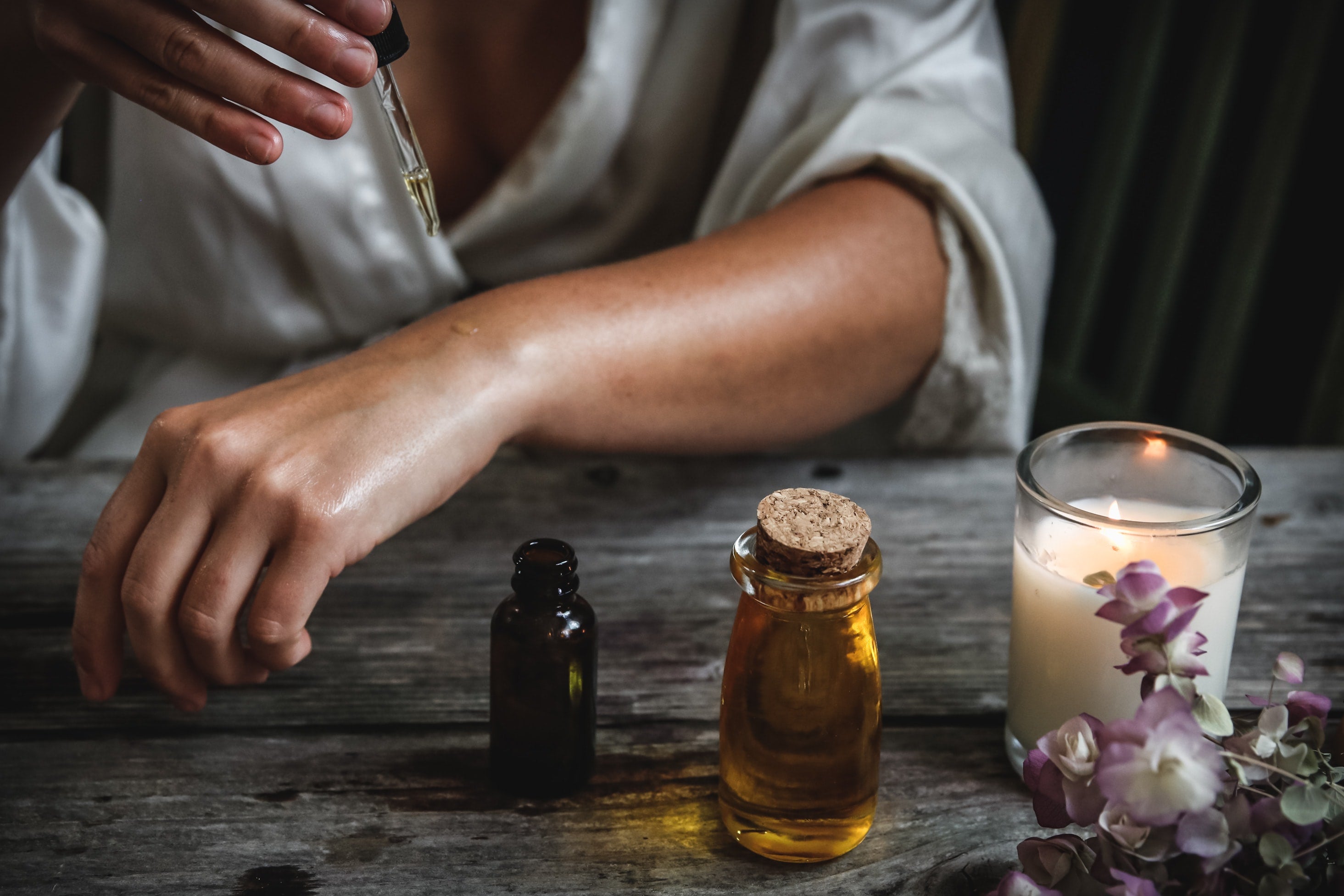 Woman applying rosehip oil